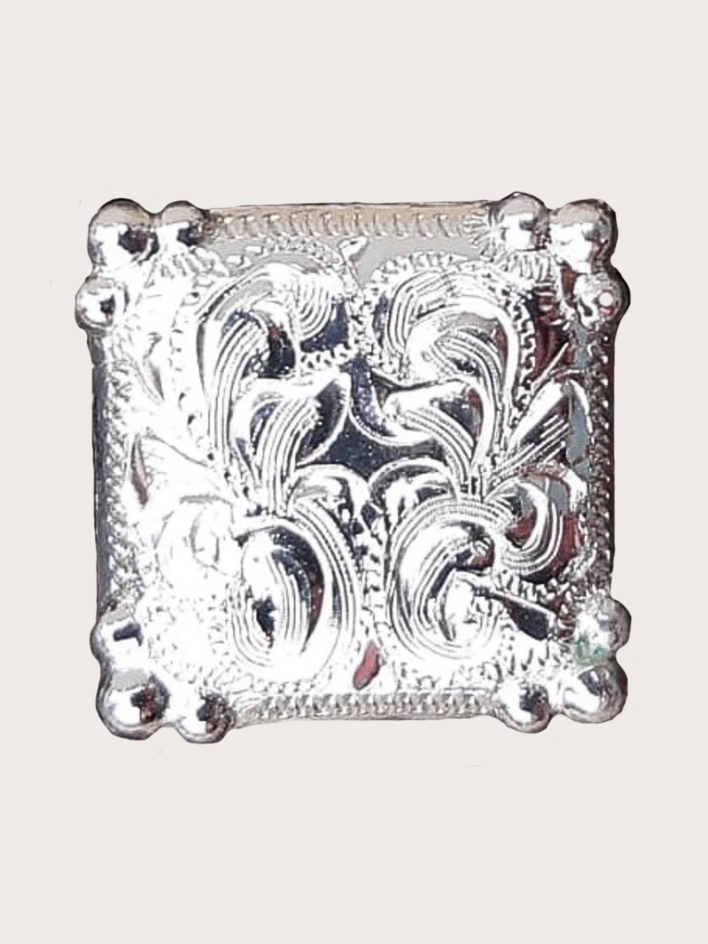 Hansen Silver Conchos